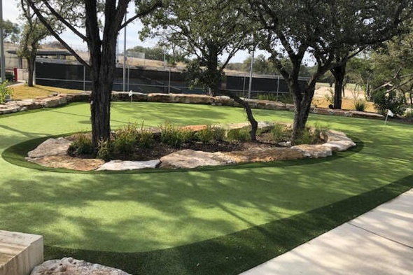 Asheville residential backyard putting green grass